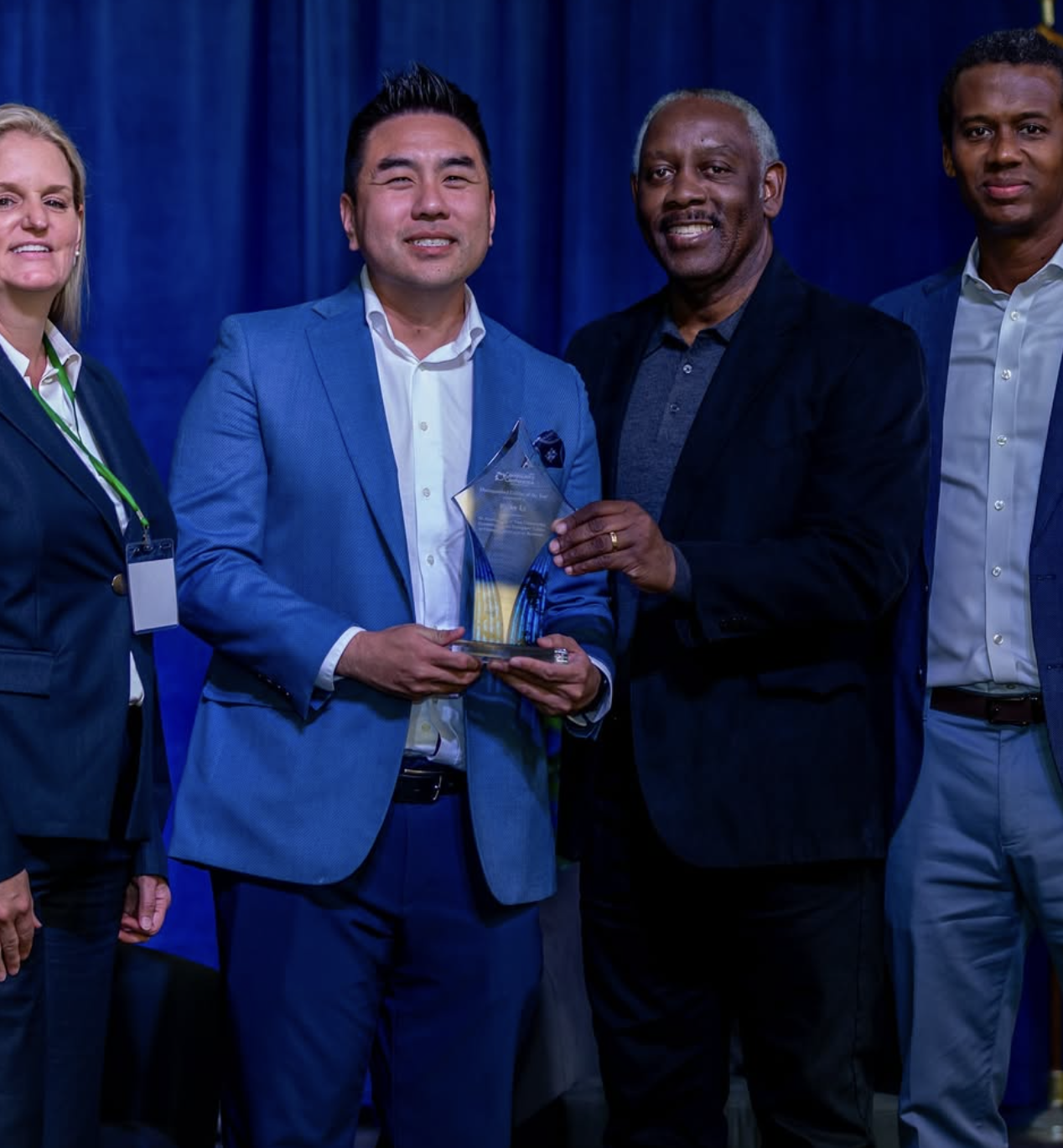 Ricky Ly receiving Distinguished Citizen of the Year award